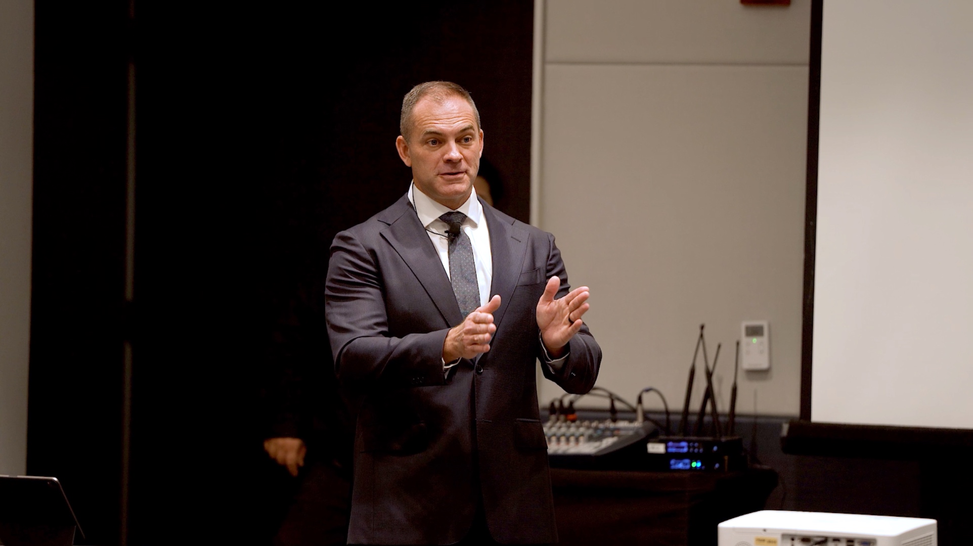 Nic McKinley speaking at a corporate leadership event